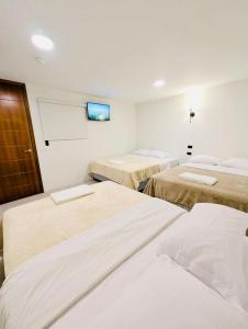Letto o letti in una camera di Hotel Bombay