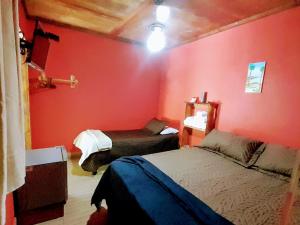 Cama ou camas em um quarto em Chalés Guigó-Cumuruxatiba, sossego e privacidade