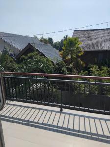 Balkón nebo terasa v ubytování Sujiwa Ubud Hotel & Villa