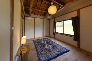 Postel nebo postele na pokoji v ubytování 国東市の自然に囲まれた一棟貸し宿