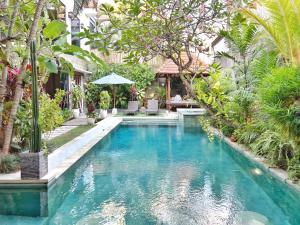Бассейн в Villa Katalini - Amazing 4BR Tropical Villa Seminyak или поблизости
