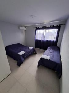 Postel nebo postele na pokoji v ubytování Baumhaus + 17 fotografií