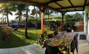 Giardino di Maison Les Cocotiers de Plaiz'Anse