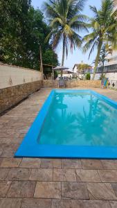 Bazén v ubytování House Beach Brasil nebo v jeho okolí