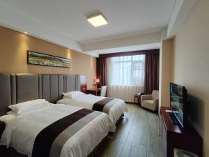 Postel nebo postele na pokoji v ubytování Bestway Hotel Xi'an + 37 fotografií