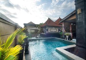 Bazén v ubytování Batukaru Garden 5 Bali Sevilla Residence nebo v jeho okolí