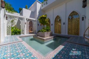 Бассейн в Sana Tulum Beachfront Boutique Hotel или поблизости