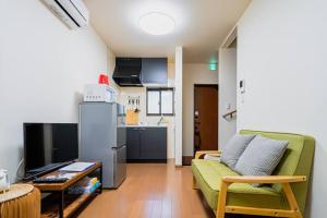 Et tv og/eller underholdning på 萱の小築