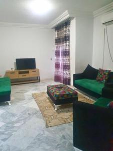 Posezení v ubytování Belle 2 Chambres avec Internet - Ennasr 2 Hedi Nouira - Parfait Pour Les familles - Vue panoramique