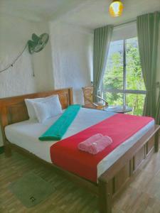 Postel nebo postele na pokoji v ubytování Green view Kandy