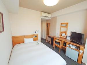 Katil atau katil-katil dalam bilik di Hotel Route-Inn Shibata Inter