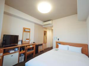 Katil atau katil-katil dalam bilik di Hotel Route-Inn Shibata Inter