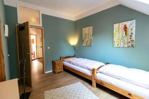 Postel nebo postele na pokoji v ubytování Mohnblume