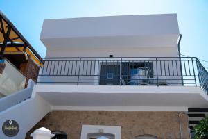 a view of the balcony of a house at Seaside Apartments in Emporeios