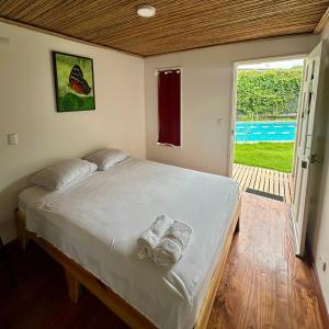 Postel nebo postele na pokoji v ubytování Hotel Tama Lodge
