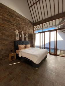 Ένα ή περισσότερα κρεβάτια σε δωμάτιο στο Mangrove Bali Villa +17 φωτογραφίες
