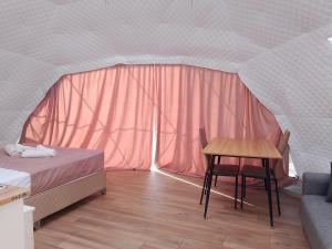 Voodi või voodid majutusasutuse Glamping Machakhela 2 toas