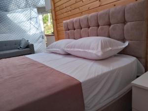 Voodi või voodid majutusasutuse Glamping Machakhela 2 toas