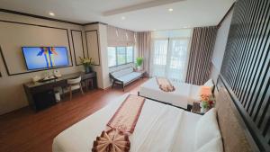 TV a/nebo společenská místnost v ubytování Hanoi HM Boutique Hotel