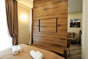 Postel nebo postele na pokoji v ubytování Hotel Giorgi Tbilisi