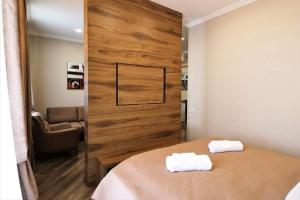 Postel nebo postele na pokoji v ubytování Hotel Giorgi Tbilisi