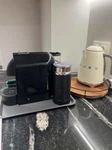 Kuchyň nebo kuchyňský kout v ubytování Hotel Kardinal