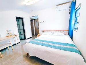 Letto o letti in una camera di 九华山风景区随侣同行民宿