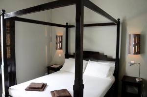 Letto o letti in una camera di Casa Colonial