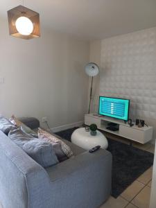 Χώρος καθιστικού στο Stunning apartment in Sandton