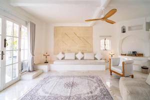 Tempat tidur dalam kamar di La Santa Rosa