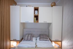 Postel nebo postele na pokoji v ubytování MB APARTMAN TARA