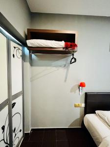 Postel nebo postele na pokoji v ubytování DS Hotel