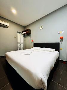 Postel nebo postele na pokoji v ubytování DS Hotel