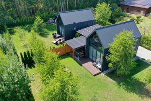 an overhead view of a house with solar panels on it at Adomki in Augustów