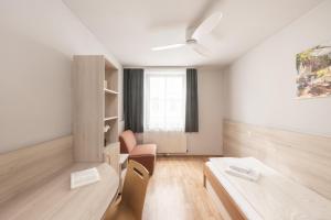 Posteľ alebo postele v izbe v ubytovaní myNext - Hotel Rudy