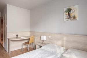 Posteľ alebo postele v izbe v ubytovaní myNext - Hotel Rudy