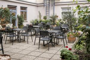 Reštaurácia alebo iné gastronomické zariadenie v ubytovaní myNext - Hotel Rudy