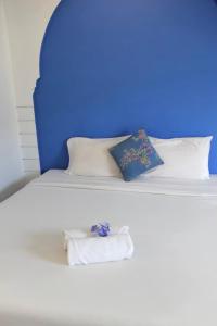 Postel nebo postele na pokoji v ubytování Dinar Lodge