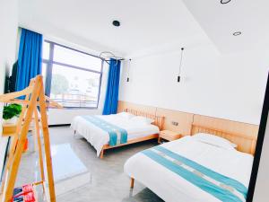 Letto o letti in una camera di 九华山风景区随侣同行民宿