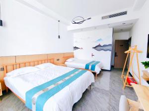 Letto o letti in una camera di 九华山风景区随侣同行民宿