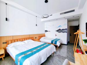 Letto o letti in una camera di 九华山风景区随侣同行民宿