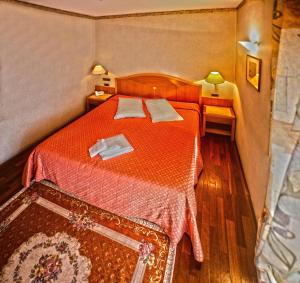 Postel nebo postele na pokoji v ubytování Hotel Lory & Ristorante Ferraro
