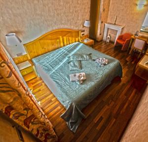 Postel nebo postele na pokoji v ubytování Hotel Lory & Ristorante Ferraro