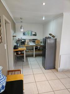 Kuchyň nebo kuchyňský kout v ubytování Stannards Guest Lodge 4 Star B&B, Knysna