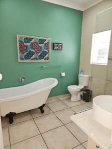 Koupelna v ubytování Stannards Guest Lodge 4 Star B&B, Knysna