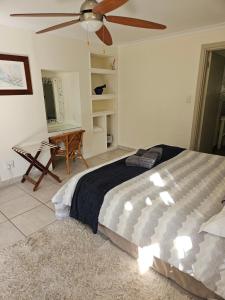 Postel nebo postele na pokoji v ubytování Stannards Guest Lodge 4 Star B&B, Knysna