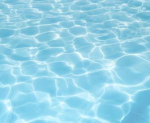 an image of a pool of blue water at Pinea 620 - Easy - Rent Apartments VI piętro z widokiem na morze in Pobierowo