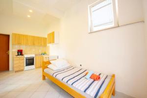 Kuchyň nebo kuchyňský kout v ubytování Apartments Claudia