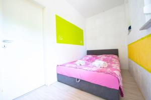 Postel nebo postele na pokoji v ubytování Apartments Claudia
