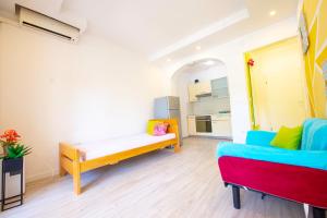 Postel nebo postele na pokoji v ubytování Apartments Claudia